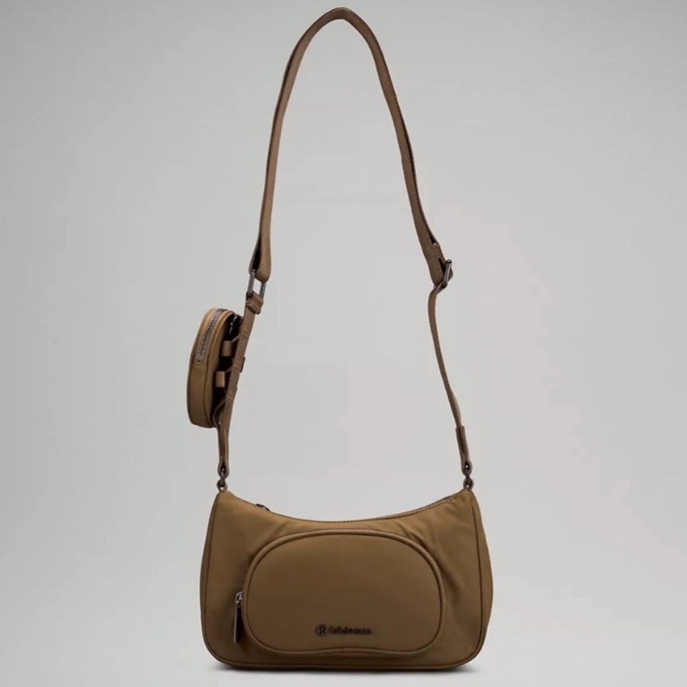 NWT Lululemon crossbody with nano pouch artifact. Offers are welcome!